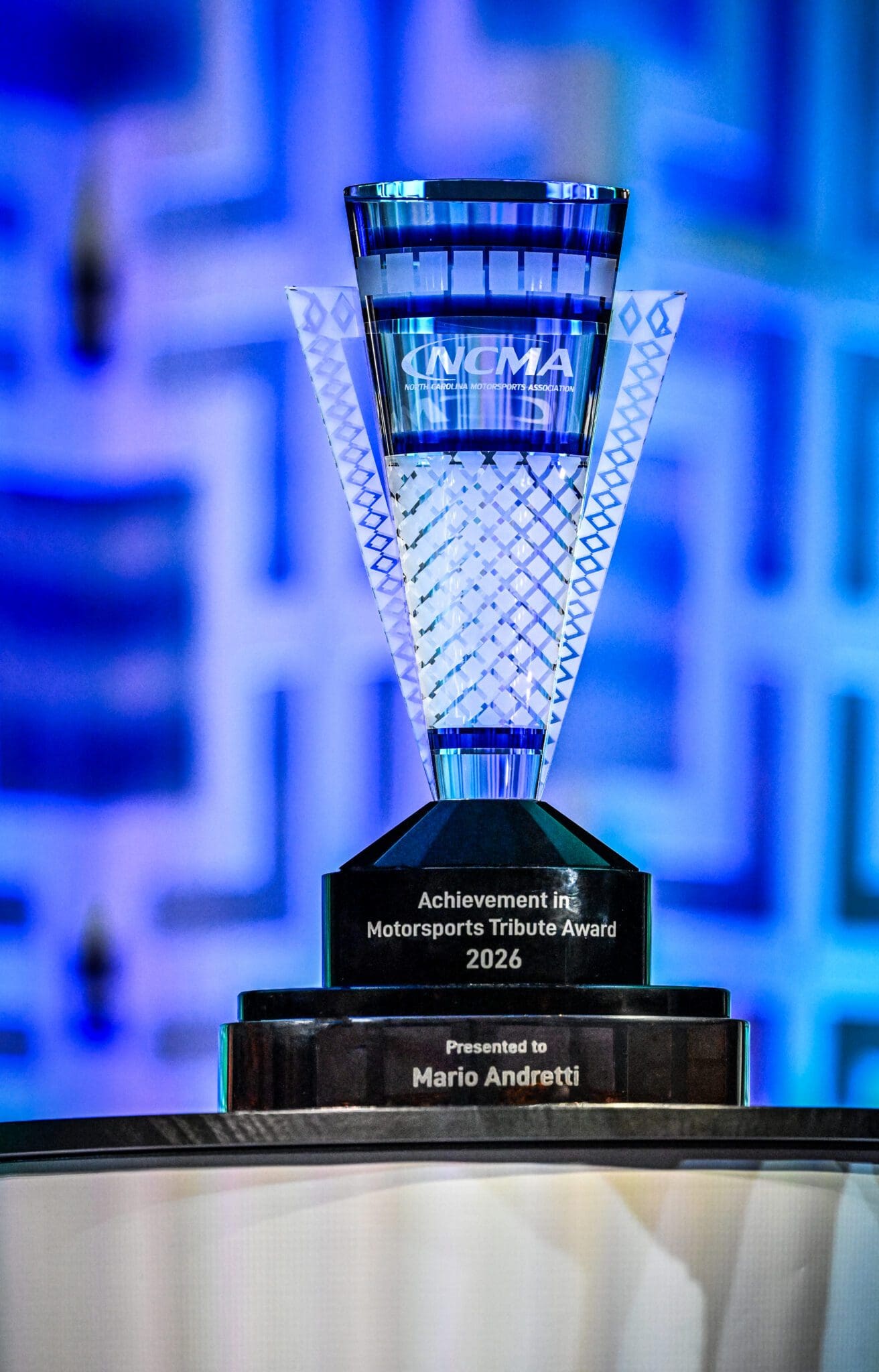 Crystal motorsports trophy with blue lighting